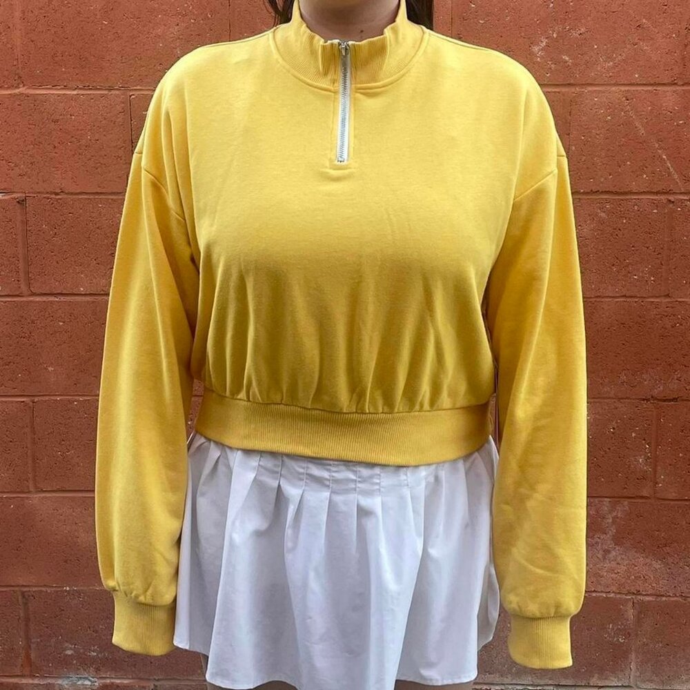 Yellow pullover sweater